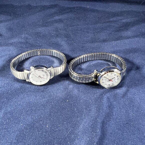 2 Timex Watches For Parts/Repair Silver Tone Stretch Band White Dial Water Resis - Picture 1 of 3